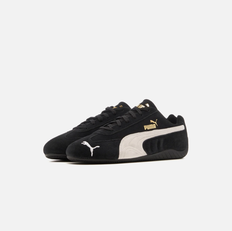 PUMA Low-Profile Sneakers – Black & White with Gold-Tone Branding