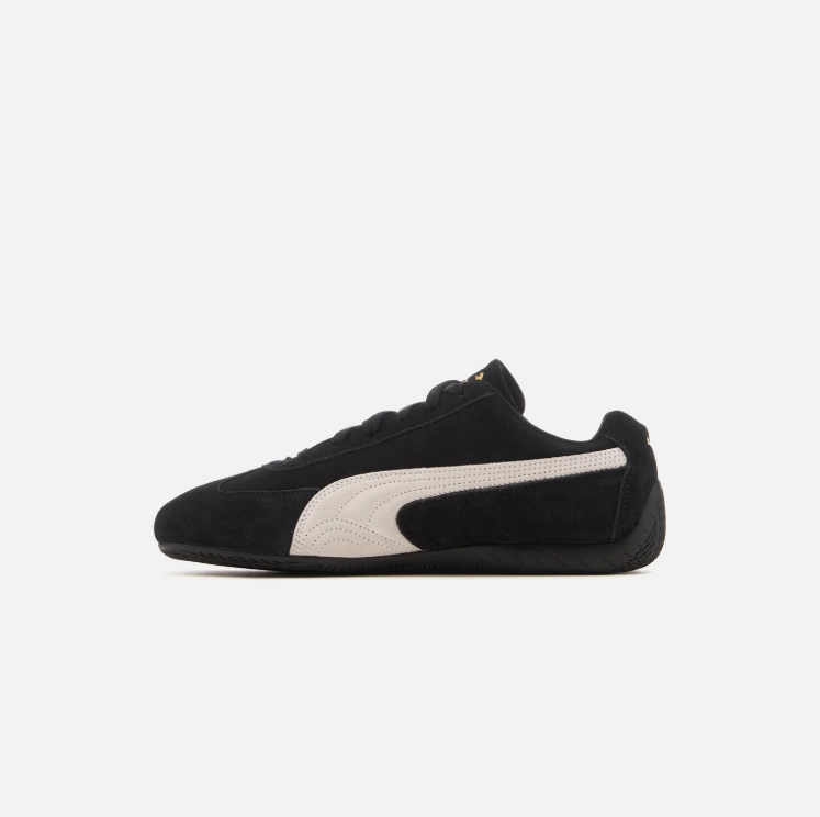 PUMA Low-Profile Sneakers – Black & White with Gold-Tone Branding