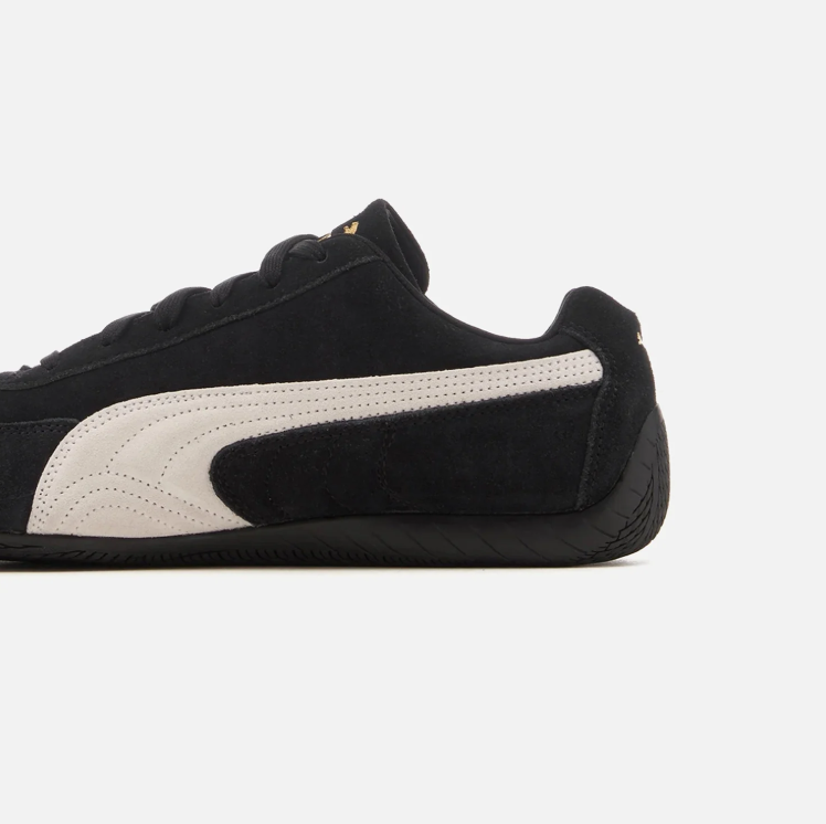 PUMA Low-Profile Sneakers – Black & White with Gold-Tone Branding