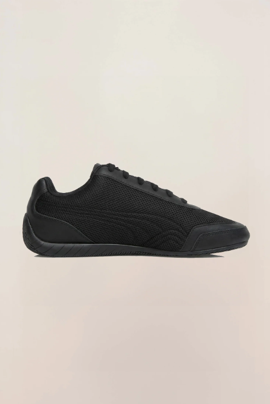 PUMA Low-Profile Sneakers – All Black with Mesh-Textured Panels
