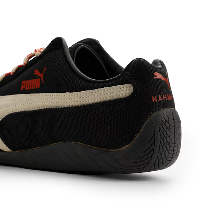 PUMA Low-Profile Sneakers – Black & Cream with Red-Patterned Laces