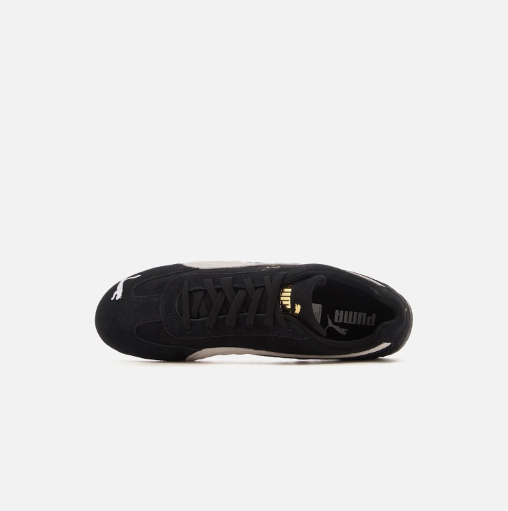 PUMA Low-Profile Sneakers – Black & White with Gold-Tone Branding