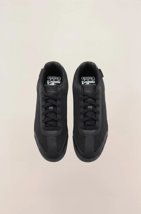 PUMA Low-Profile Sneakers – All Black with Mesh-Textured Panels